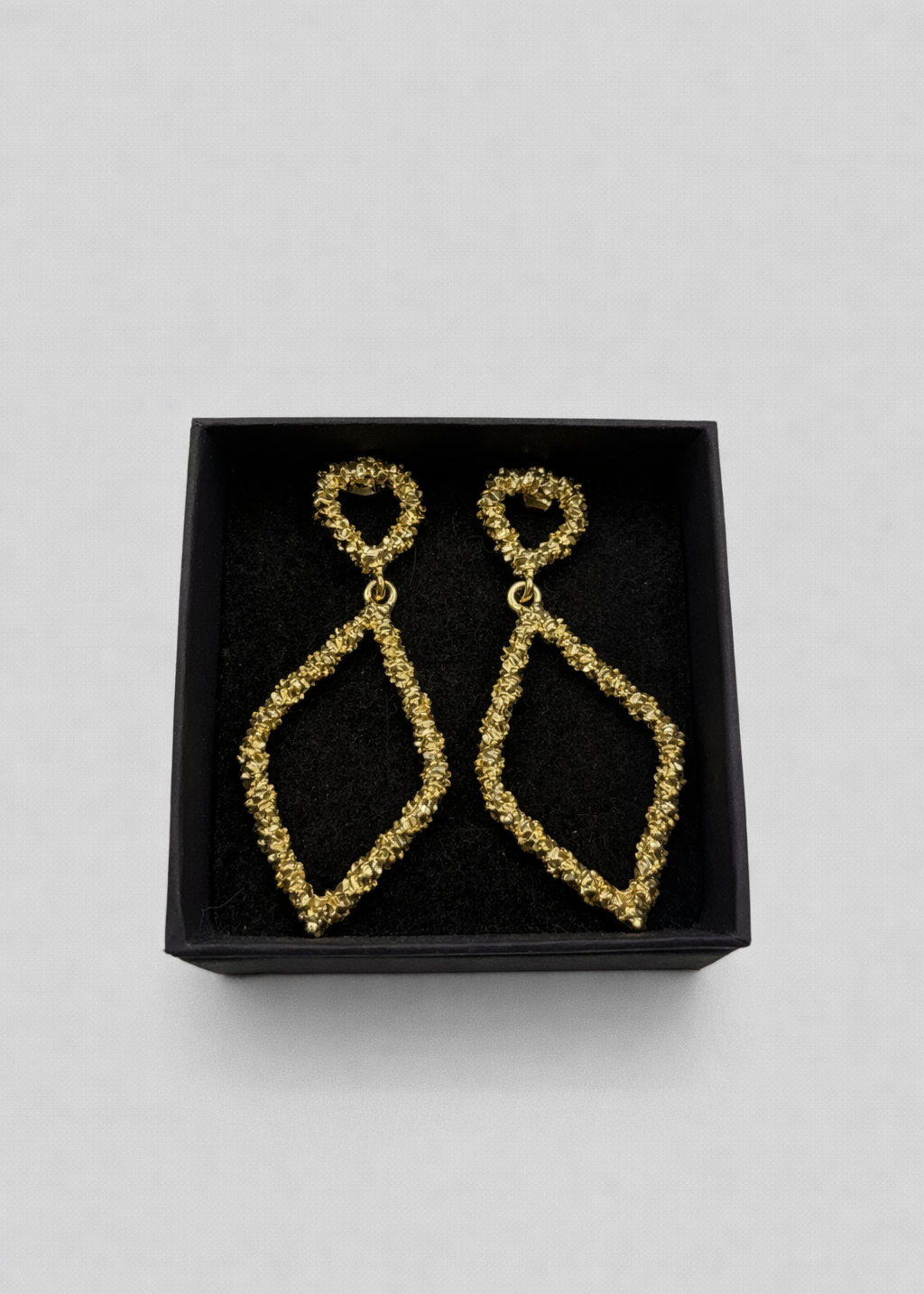 Boucles d’oreilles dorées losange