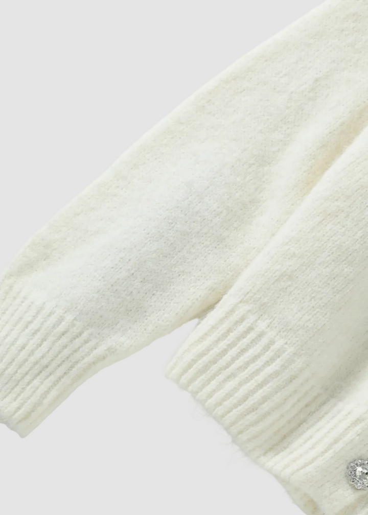 Cardigan à col en V avec accent floral délicat