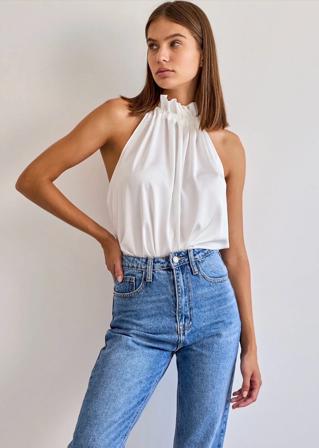 Top satiné avec noeud au col