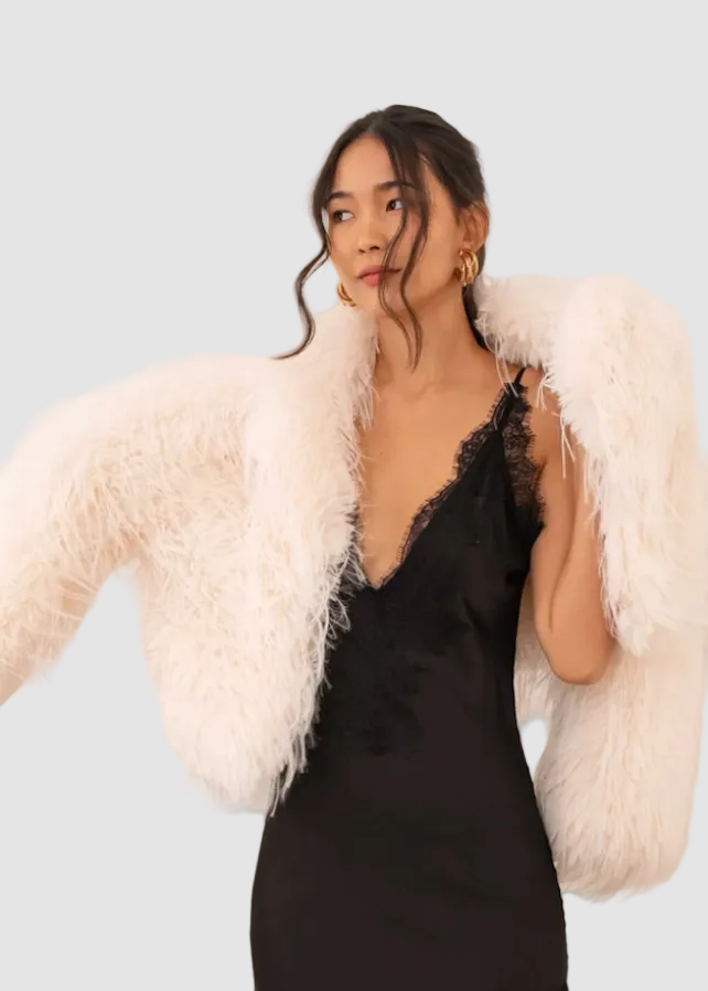 Veste à col en fausse fourrure